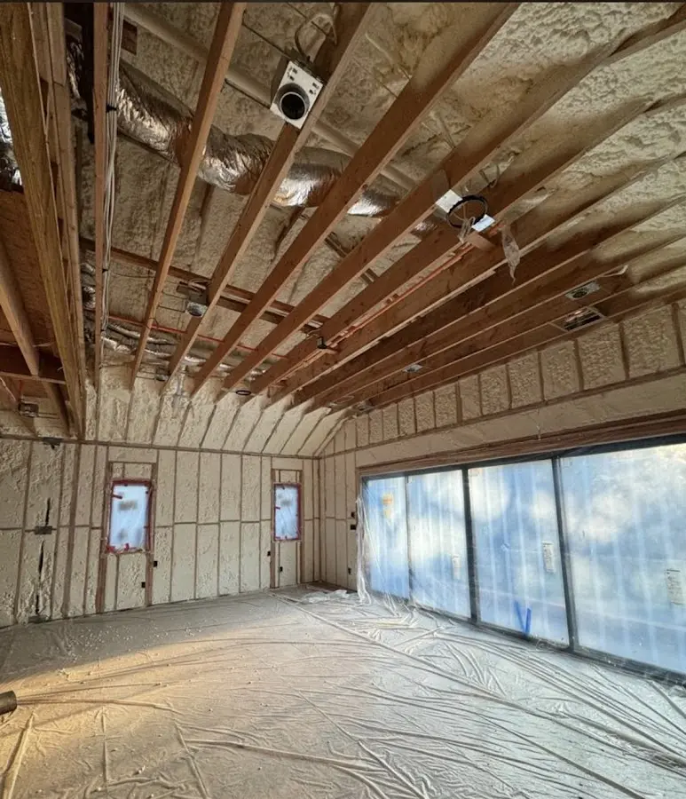 Interior walls and ceiling insulated with spray foam during new construction in Hockessin